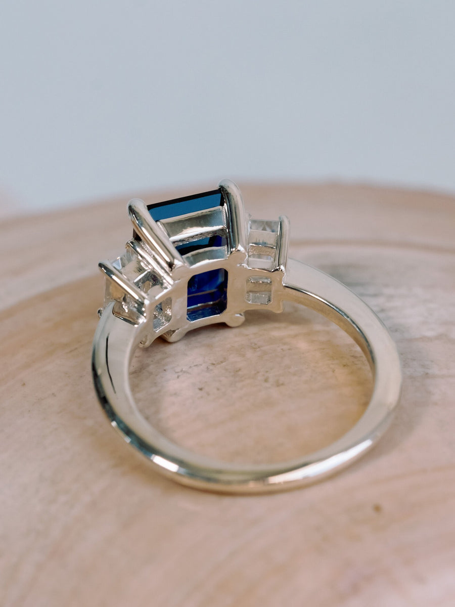 Three Stone Emerald Cut Sapphire and Moissanite Engagement Ring