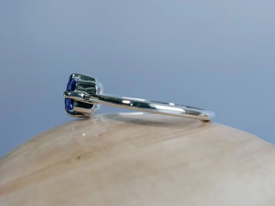 Natural Emerald Cut Tanzanite East West Compass Ring