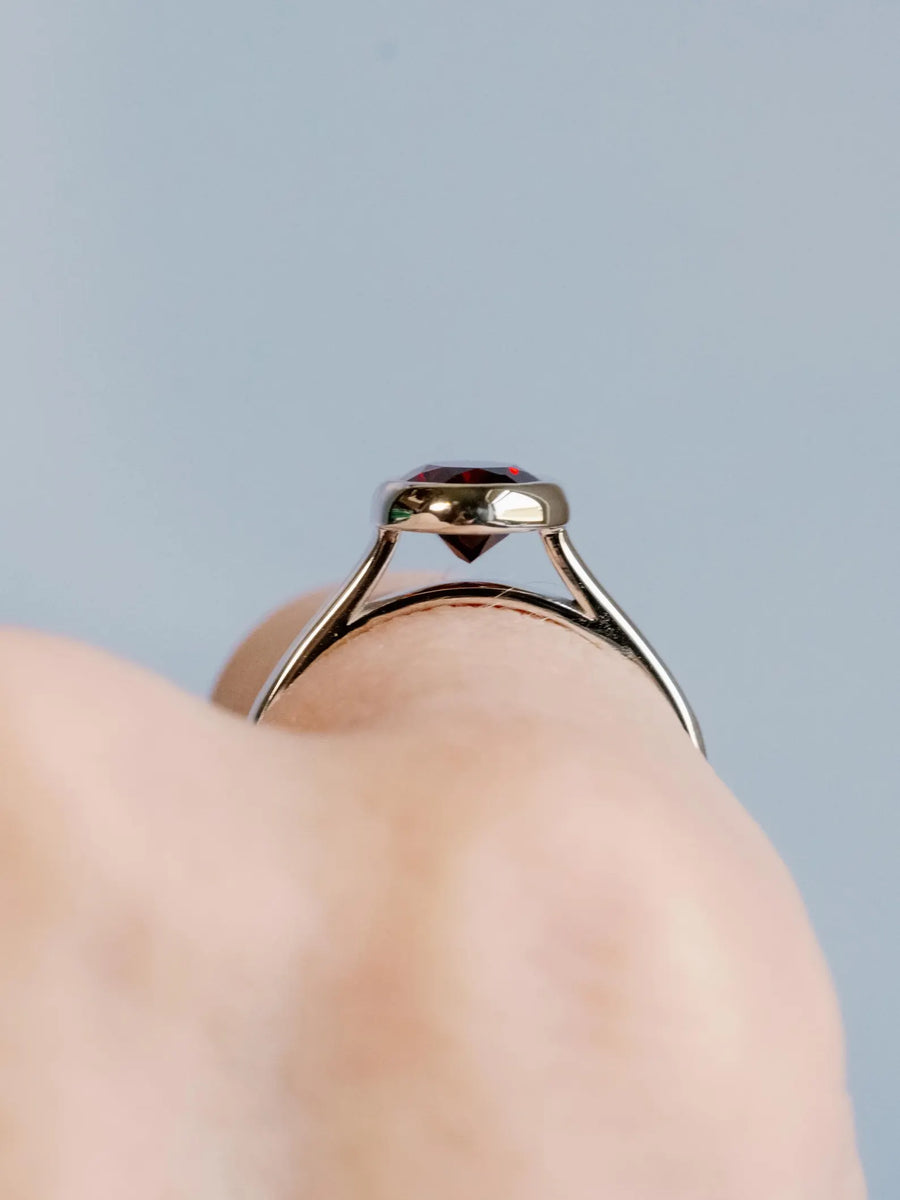 14k Oval Cut Garnet Bezel Setting Ring