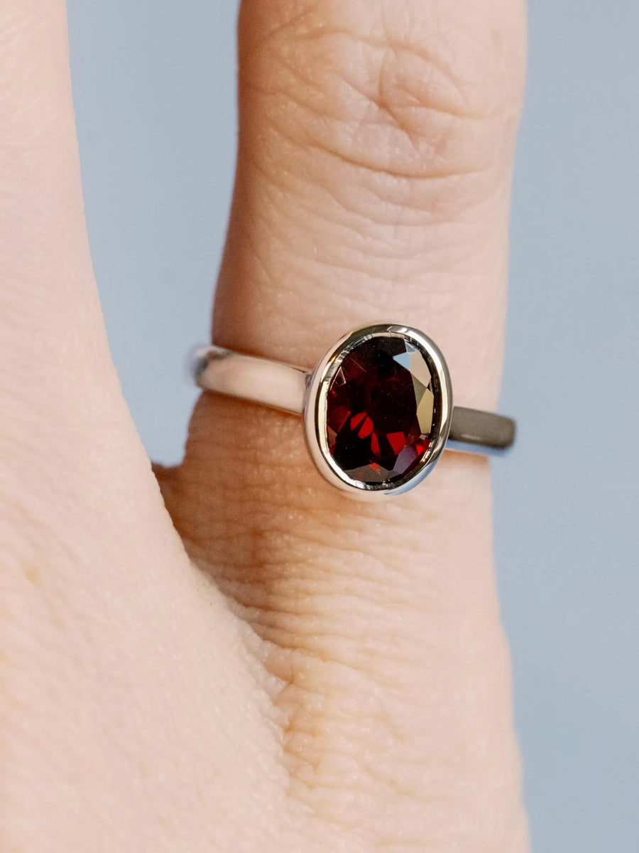 14k Oval Cut Garnet Bezel Setting Ring