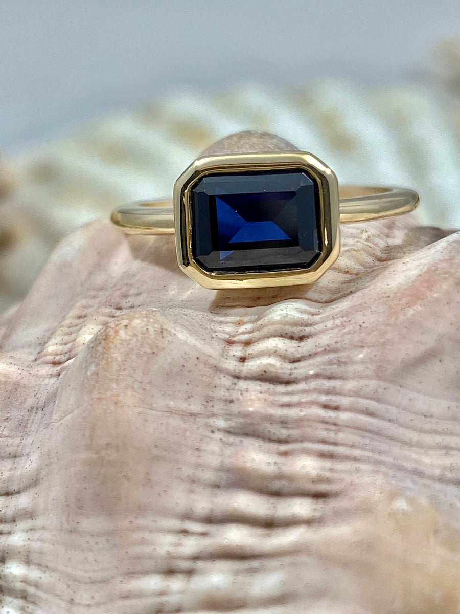 14k East West Emerald Cut Sapphire Ring