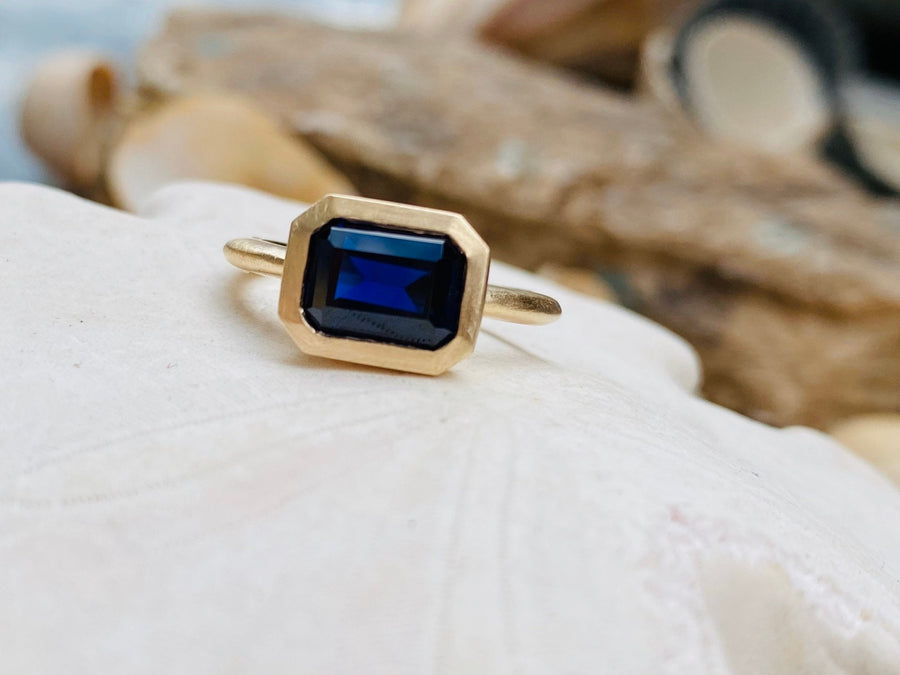 14k East West Emerald Cut Sapphire Ring