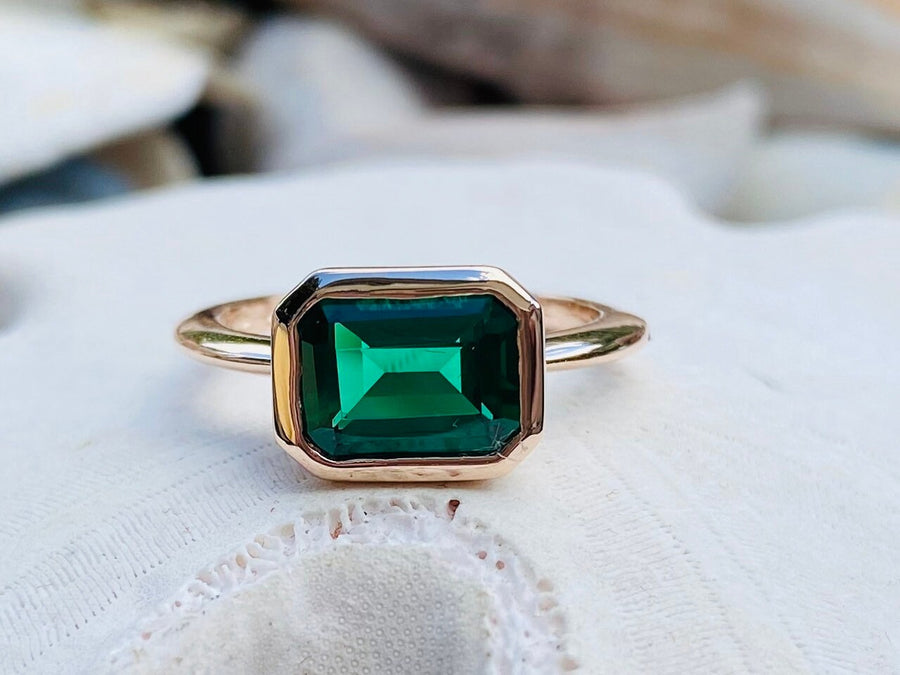 14k Gold East West Emerald Cut Emerald Solitaire Ring