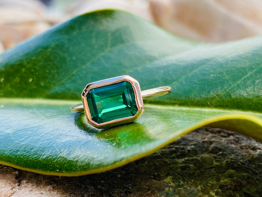 14k Gold East West Emerald Cut Emerald Solitaire Ring