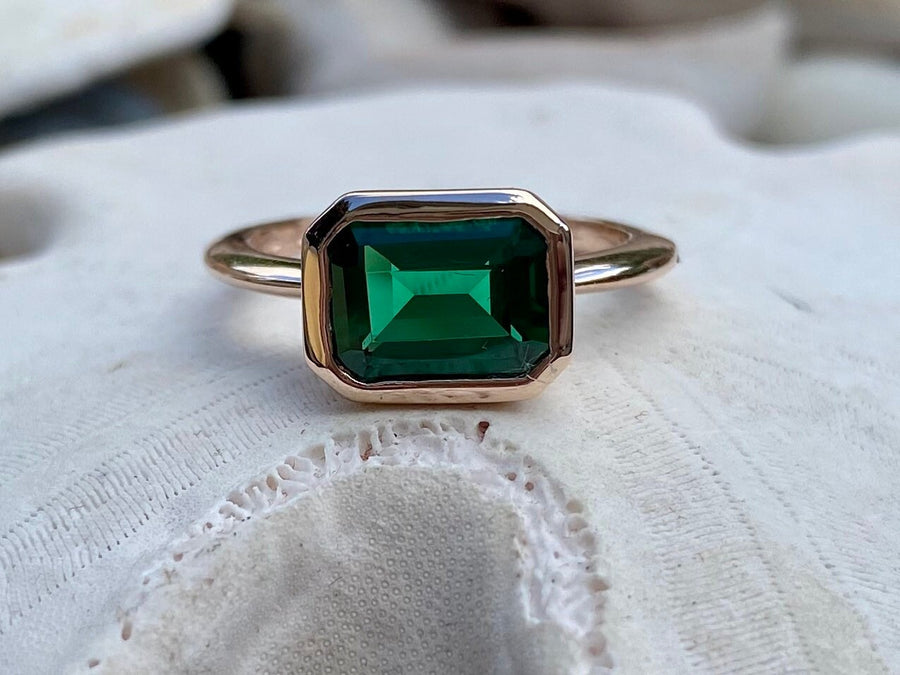 14k Gold East West Emerald Cut Emerald Solitaire Ring