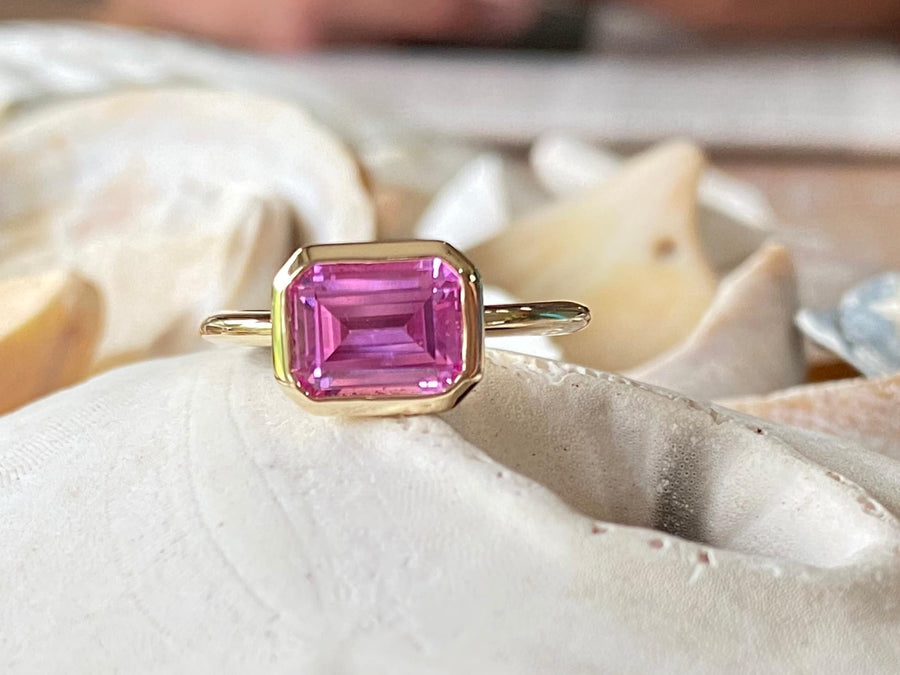 East West Emerald Cut Pink Topaz Ring
