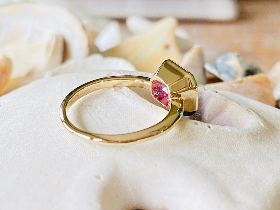East West Emerald Cut Pink Topaz Ring