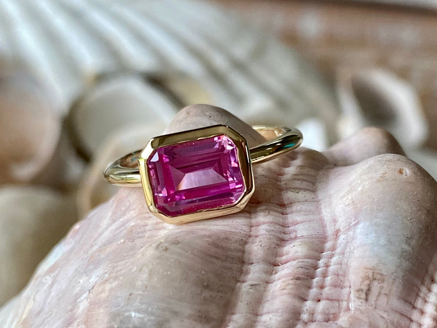 East West Emerald Cut Pink Topaz Ring
