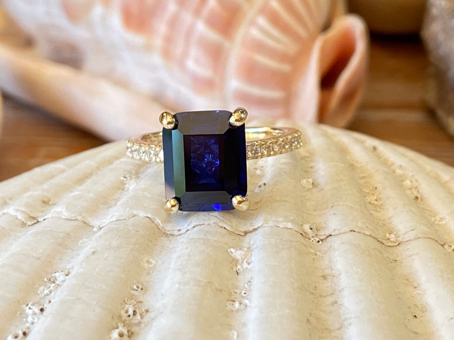 Gold Emerald Cut Sapphire Engagement Ring