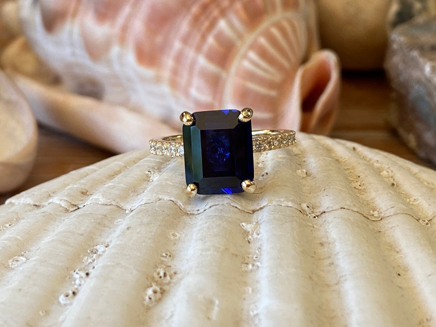 Gold Emerald Cut Sapphire Engagement Ring
