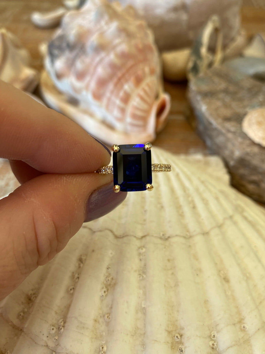 Gold Emerald Cut Sapphire Engagement Ring
