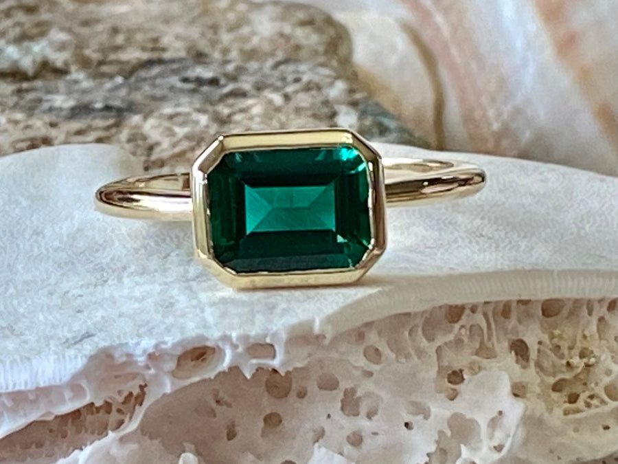 14k Gold East West Emerald Cut Emerald Solitaire Ring