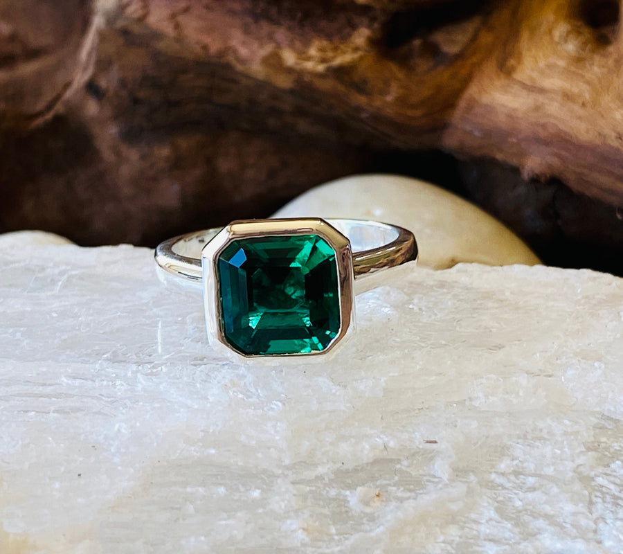 Emerald Asscher Cut Solitaire Ring