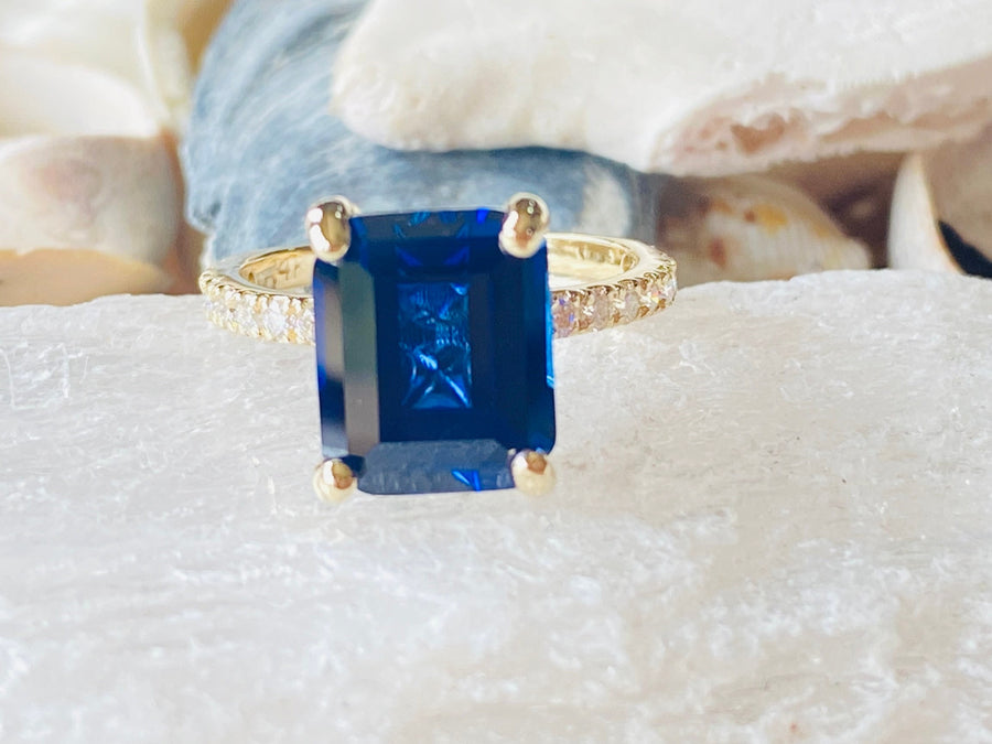 Gold Emerald Cut Sapphire Engagement Ring