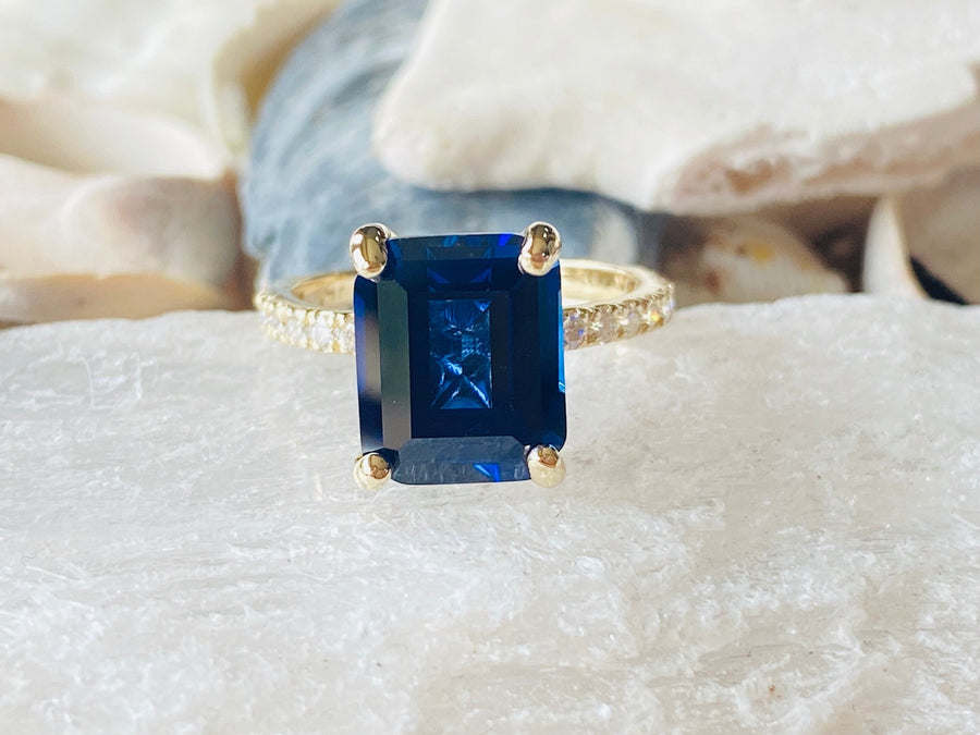 Gold Emerald Cut Sapphire Engagement Ring