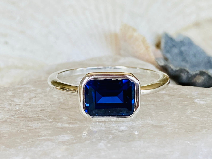 14k East West Emerald Cut Sapphire Ring