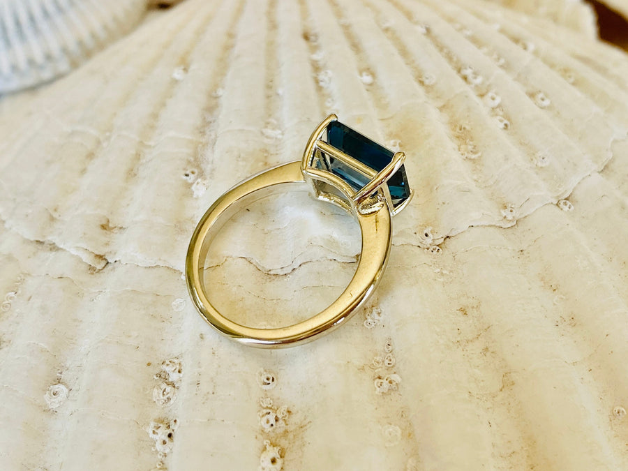 East West Emerald Cut London Blue Topaz Solitaire Ring