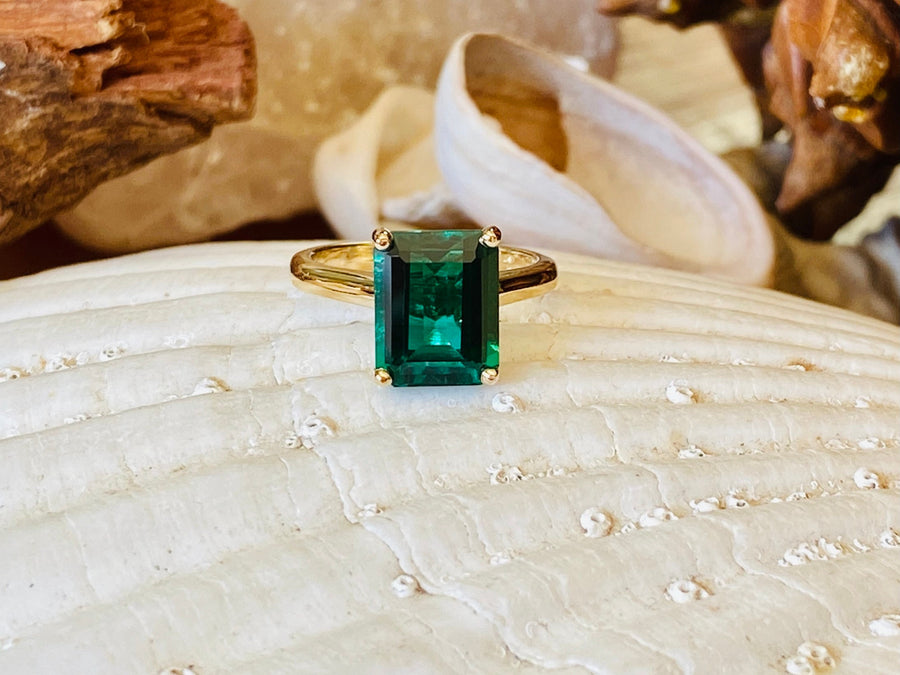 14k Gold Emerald Cut Emerald Solitaire Ring Cathedral Setting