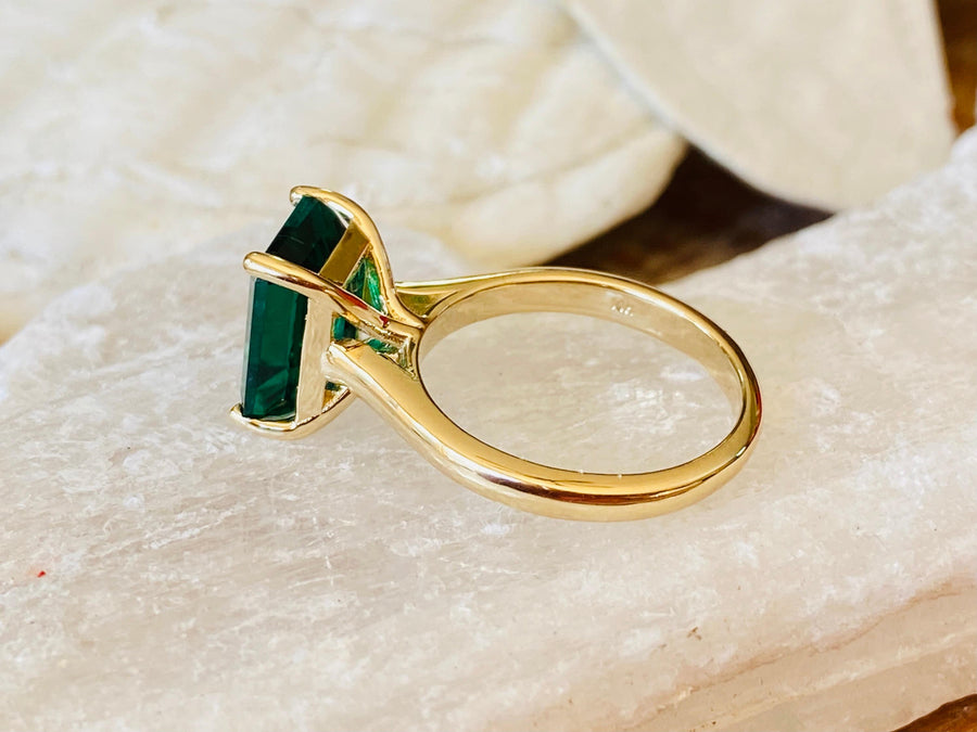 14k Gold Emerald Cut Emerald Solitaire Ring Cathedral Setting