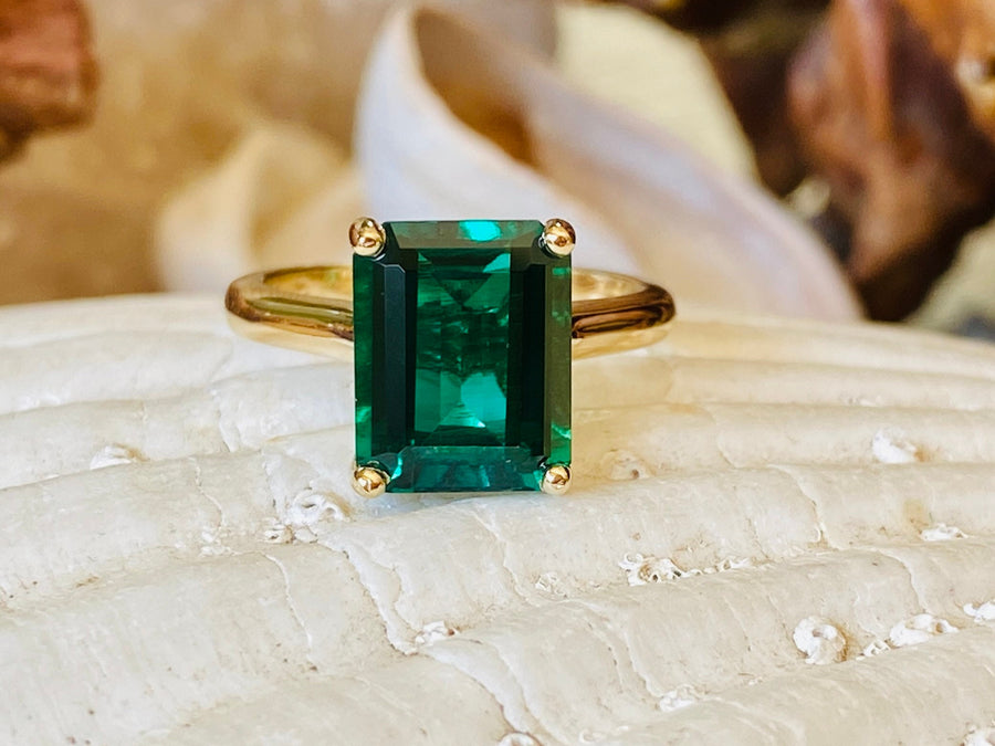 14k Gold Emerald Cut Emerald Solitaire Ring Cathedral Setting