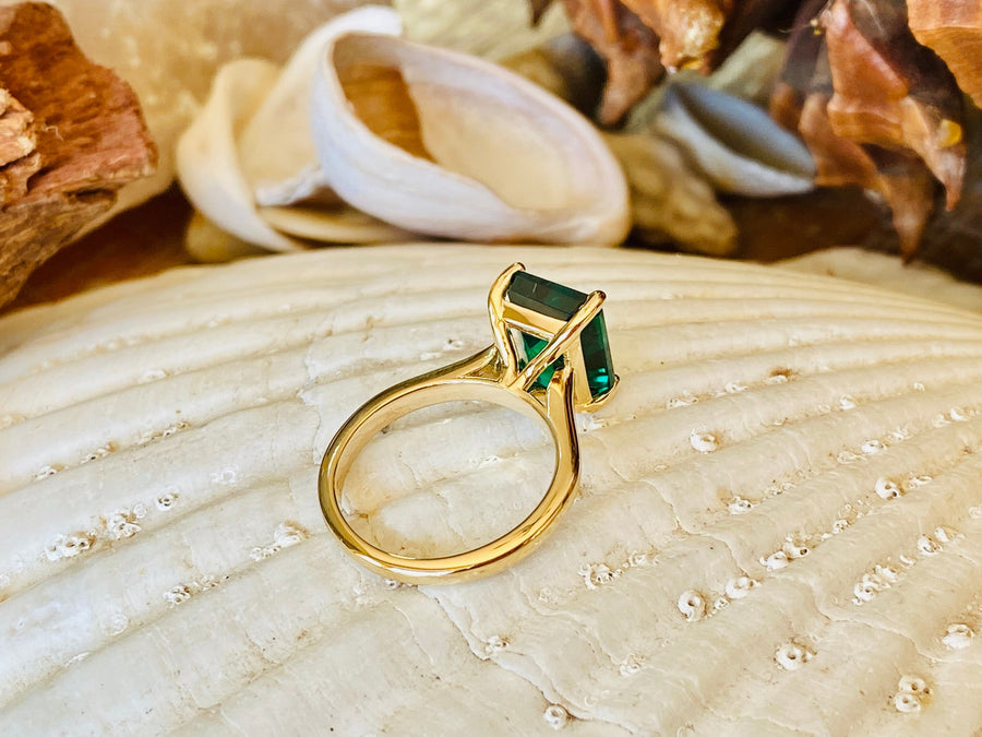 14k Gold Emerald Cut Emerald Solitaire Ring Cathedral Setting