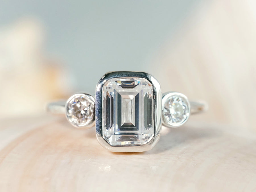 Moissanite Emerald Cut Three Stone Engagement Bezel Ring