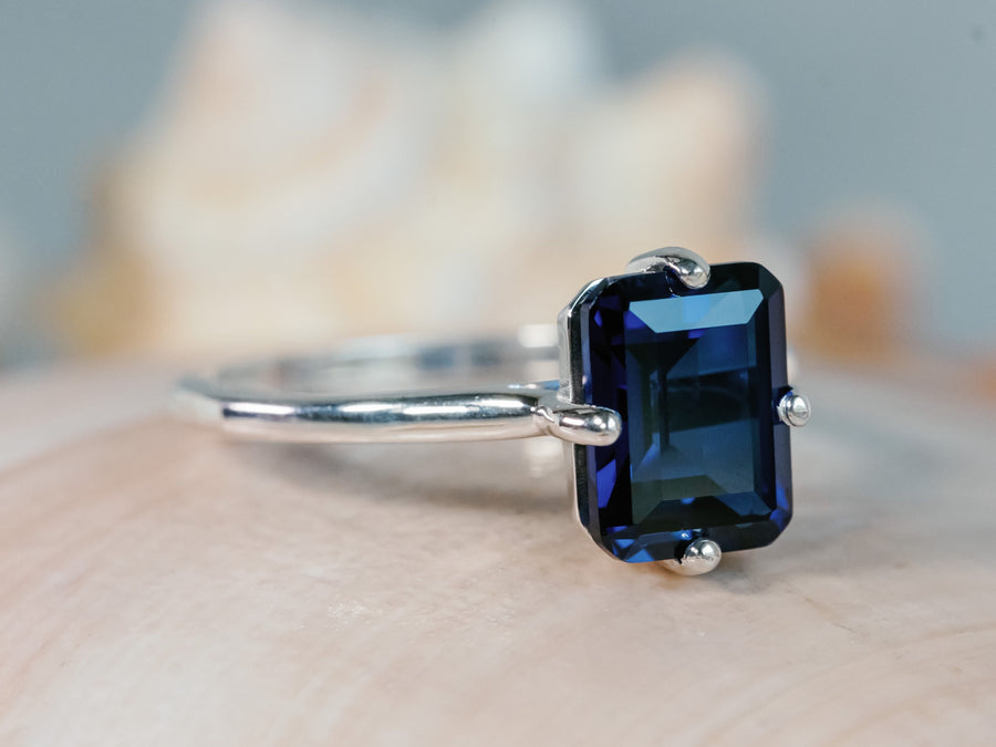 white gold sapphire ring side angle