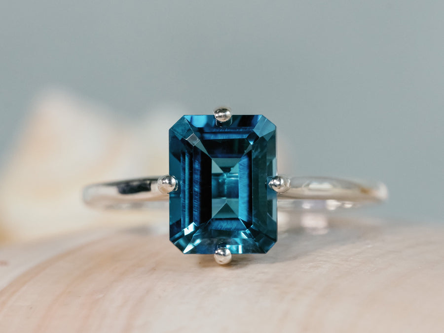 14k Emerald Cut London Blue Topaz Solitaire Ring, Compass Set