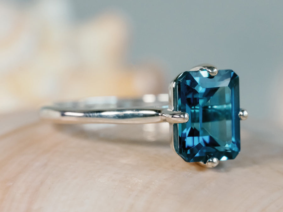 14k Emerald Cut London Blue Topaz Solitaire Ring, Compass Set